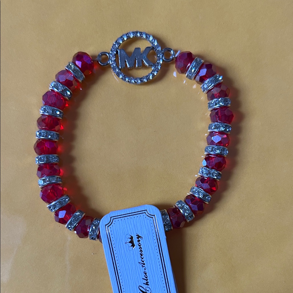 Elegant Red Crystal Bracelet With Silver Accents